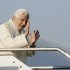 Pope Benedict XVI waves to reporters as he boards a plane to Benin, at Fiumicino international airport, near Rome, Friday, Nov. 18, 2011. Pope Benedict XVI had his first meeting with Italy's new leader on the tarmac of Rome's airport just before taking off for a trip to Africa. Premier Mario Monti greeted the pope Friday morning as Benedict descended from the helicopter that brought him from the Vatican to Rome's airport. They chatted as they walked slowly across the tarmac to the pope's waiting plane. Benedict then took off for the west African nation of Benin for a three-day visit where he will speak of the role of the church in Africa. (AP Photo/Riccardo De Luca)
