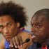 Cape Verde Islands' captain Neves looks on as team coach Antunes speaks during a news conference in Port Elizabeth