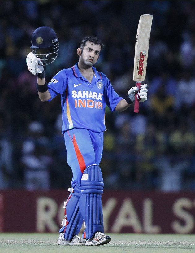 India&#39;s Gambhir celebrates after scoring a century during the third One-Day International cricket match against Sri Lanka in Colombo