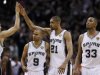 San Antonio Spurs' Duncan celebrates with teammates Green, Parker and Diaw during the fourth quarter in Game 5 of their NBA Finals basketball series in San Antonio