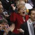 File photo of German Chancellor Merkel celebrateing during 2010 World Cup quarter-final soccer match against Argentina in Cape Town