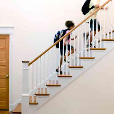 Children-running-up-stairs-after-school_web