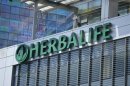 The Herbalife logo is seen on a building housing some of their offices in downtown Los Angeles, California