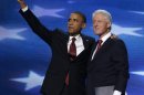 President Barack Obama waves as he joins Former President Bill Clinton during the Democratic National Convention in Charlotte, N.C., on Wednesday, Sept. 5, 2012. (AP Photo/Charles Dharapak)