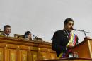 Venezuelan President Nicolas Maduro (R) presents the annual report before the opposition controlled National Assembly in Caracas on January 15, 2016