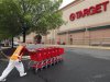 A Target employee returns carts to the store in Falls Church