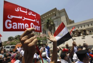 Egyptians celebrate in front of the constitutional …