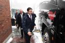 US Republican presidential candidate Marco Rubio walks to his bus after a campaign stop in Manchester, New Hampshire, on February 8, 2016