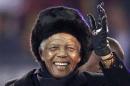 File photo of former South African President Nelson Mandela waving to the crowd during the closing ceremony for the 2010 World Cup in Johannesburg