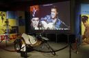 In this Nov. 25, 2013 photo, a custom motorcycle is displayed in the Elvis exhibit at the Rock and Roll Hall of Fame and Museum in Cleveland. Over 40 new items on loan from Graceland, excluding the cycle, will be displayed when the exhibit reopens. (AP Photo/Mark Duncan)