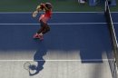 Serena Williams returns a shot to Li Na, of China,during the semifinals of the 2013 U.S. Open tennis tournament, Friday, Sept. 6, 2013, in New York. (AP Photo/Mike Groll)