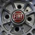 Fiat logo is seen on the wheel of a Fiat car in Turin