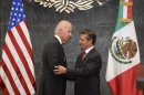 US Vice-President Joe Biden (L) and Mexican President Enrique Pena Nieto in Mexico City, on September 20, 2013