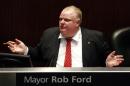 Toronto Mayor Rob Ford attends a special council meeting at City Hall in Toronto