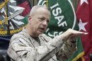 U.S. Gen. John Allen, top commander of the NATO-led International Security Assistance Forces (ISAF) and US forces in Afghanistan gestures during an interview with the Associated Press in Kabul, Afghanistan, Sunday, July 22, 2012. Gen. Allen says this year's pullout of 23,000 American troops is at the halfway point. He told The Associated Press in an interview Sunday that a significant number will leave in August and early September. (AP Photo/Musadeq Sadeq)