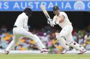 Australian batsman Shane Watson plays a shot during play on day two of the second cricket test against India in Brisbane, Australia, Thursday, December 18, 2014. (AP Photo/Tertius Pickard)