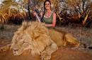 Smiling Hunter's Dead Lion Photo Highlights Big Cats' Plight