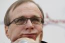 In this Dec. 13, 2011 photo, Microsoft co-founder Paul Allen listens during a a news conference in Seattle.