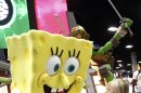 COMMERCIAL IMAGE - A fan is seen with SpongeBob SquarePants during Comic-Con on Sunday, July 15, 2012, in San Diego, Calif. (Photo by Joe Kohen/Invision for Nickelodeon/AP Images)