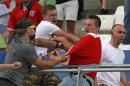 Russian supporters attack an England fan at the end of the Euro 2016 Group B soccer match between England and Russia, at the Velodrome stadium in Marseille, France, Saturday, June 11, 2016. (AP Photo/Thanassis Stavrakis)