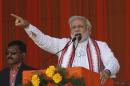 Modi addresses his supporters during a rally in Amroha