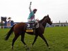 Tom Quealy on Frankel celebrates after winning The Champion Stakes during the British Champions Day at Ascot racecourse in southern England