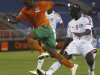 Saif Eldin Ali Idris Farah of Sudan challenges Rainford Kalaba of Zambia during their African Nations Cup quarter-final soccer match in Bata