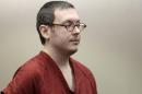 Colorado movie massacre gunman James Holmes listens at a court hearing before beginning his life sentence with no chance of parole, in Centennial, Colorado