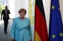 German Chancellor Merkel arrives for a statement in Berlin