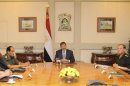 Egypt's President Mohamed Mursi meets with his senior security officials during an emergency meeting at the presidential palace in Cairo
