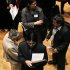 File photo of people waiting in line to meet a job recruiter at the UJA-Federation Connect to Care job fair in New York