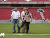 Brazil's President Dilma Rousseff kicks a soccer ball as she inaugurates the Arena Pernambuco stadium in Sao Lourenco da Mata