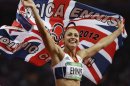Britain's Jessica Ennis celebrates winning gold following the 800-meter heptathlon during the athletics in the Olympic Stadium at the 2012 Summer Olympics, London, Saturday, Aug. 4, 2012. (AP Photo/Anja Niedringhaus)