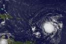 Tropical Storm Erika is pictured in the Atlantic Ocean northeast of Venezuela in this NASA handout satellite photo