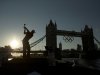 U.S. golfer Dustin Johnson is silhouetted as he takes a swing in a posed picture for photographers as Olympic rings hang from Tower Bridge ahead of the 2012 Summer Olympics, Monday, July 23, 2012, in London.  Johnson and Spanish golfer Sergio Garcia took it in turns to hit golf balls at a floating golf hole on the River Thames to promote for a sportswear maker.  Golf is set to be included as an Olympic sport in the next games in 2016.  (AP Photo/Matt Dunham)