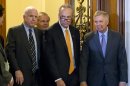 Members of the bipartisan "Gang of Eight" who crafted the immigration reform bill, Sen. Chuck Schumer, D-N.Y., center, flanked by Sen. John McCain, R-Ariz., left, and Sen. Lindsey Graham, R-S.C., leave the floor after final passage in the Senate, at the Capitol in Washington, Thursday, June 27, 2013. Sen. Robert Menendez, D-N.J., follows at rear. In remarks to reporters, Sen. Lindsey Graham, a conservative Republican, praised the leadership of Democrat Chuck Schumer, saying "Senator Schumer's a worthy successor to Ted Kennedy." (AP Photo/J. Scott Applewhite)