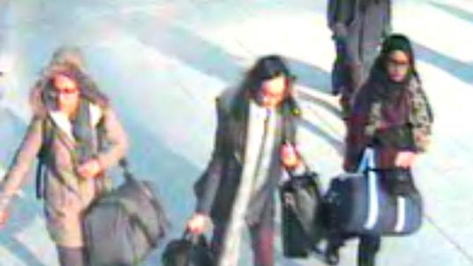 A CCTV picture shows British teenagers Amira Abase, Kadiza Sultana and Shamima Begum at Gatwick Airport on February 17, 2015