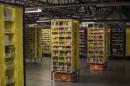 Kiva robots transport goods at an Amazon Fulfillment Center, ahead of the Christmas rush, in Tracy, California