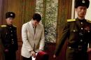American student Otto Warmbier, center, arrives at the People's Cultural House, as Warmbier is presented to reporters Monday, Feb. 29, 2016, in Pyongyang, North Korea. North Korea announced late last month that it had arrested the 21-year-old University of Virginia undergraduate student. (AP Photo/Kim Kwang Hyon)