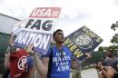 Members of the Westboro Baptist Church of Topeka, Kan., demonstrate, Tuesday, Aug. 28, 2012, in Tampa, Fla. Protestors gathered in Tampa to march in demonstration against the Republican National Convention. (AP Photo/Chris O'Meara)