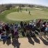 A crowd watches as Tiger Woods practices on the eighth green for the Match Play Championship golf tournament, Tuesday, Feb. 19, 2013, in Marana, Ariz. (AP Photo/Julie Jacobson)