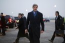 Secretary of State John Kerry arrives in Paris, Tuesday, March 26, 2013. Kerry went to Paris for talks with French officials about aid to the Syrian opposition and the situation in Mali. (AP Photo/Jason Reed, Pool)