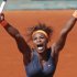 Serena Williams of the U.S. celebrates winning against Russia's Svetlana Kuznetsova in three sets 6-1, 3-6, 6-3, in their quarterfinal match at the French Open tennis tournament, at Roland Garros stadium in Paris, Tuesday June 4, 2013. (AP Photo/Christophe Ena)