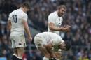 England's captain Chris Robshaw urges this players to respond as a penalty kick by South Africa is taken during the international rugby union match between England and South Africa at Twickenham stadium in London, Saturday, Nov. 15, 2014. (AP Photo/Alastair Grant)