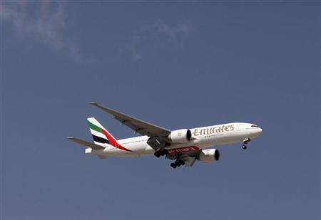 An Emirates Airlines plane lands at the Emirates terminal at Dubai International Airport, February 6, 2012. REUTERS/Jumana El Heloueh/Files