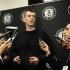 Brooklyn Nets principal owner Mikhail Prokhorov  speaks to the media concerning the firing of head coach Avery Johnson.  Prokhorov spoke at half time of an NBA basketball game against the Charlotte Bobcats on Friday, Dec., 28, 2012 at Barclays Center in New York. (AP Photo/Kathy Kmonicek)