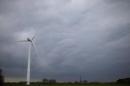 A motionless wind turbine is seen in a field in Bourgneuf-en-Retz