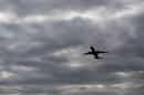 An airplane takes off from a runway at Ronald Reagan Washington National Airport in Arlington, Virginia, September 23, 2013