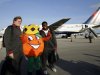 Alabama's Barrett Jones, left, and Chance Warmack, right, pose with Obie, the Orange Bowl Committee mascot, upon arriving at Miami International Airport, Wednesday, Jan. 2, 2013, in Miami. Alabama is scheduled to play Notre Dame in the BCS national championship NCAA college football game next Monday. (AP Photo/Wilfredo Lee)