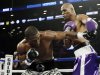 Bernard Hopkins and Tavoris Cloud fight during the fourth round of an IBF Light Heavyweight championship boxing match at the Barclays Center Saturday, March 9, 2013, in New York. (AP Photo/Frank Franklin II)